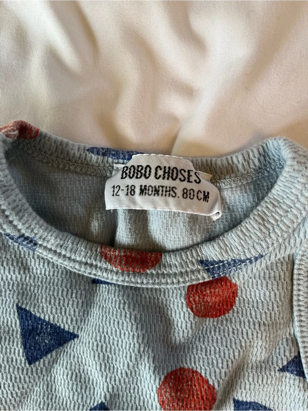 Bobo Choses Light Blue Sleeveless Bodysuit with Red Dot & Navy Triangle Print